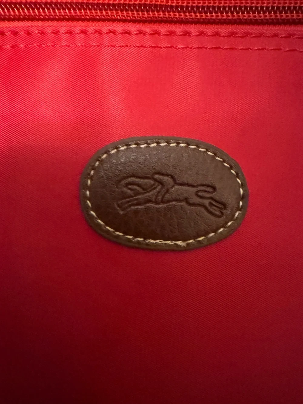 Longchamp Red Crossbody Bag with Brown Strap and Gold Accents